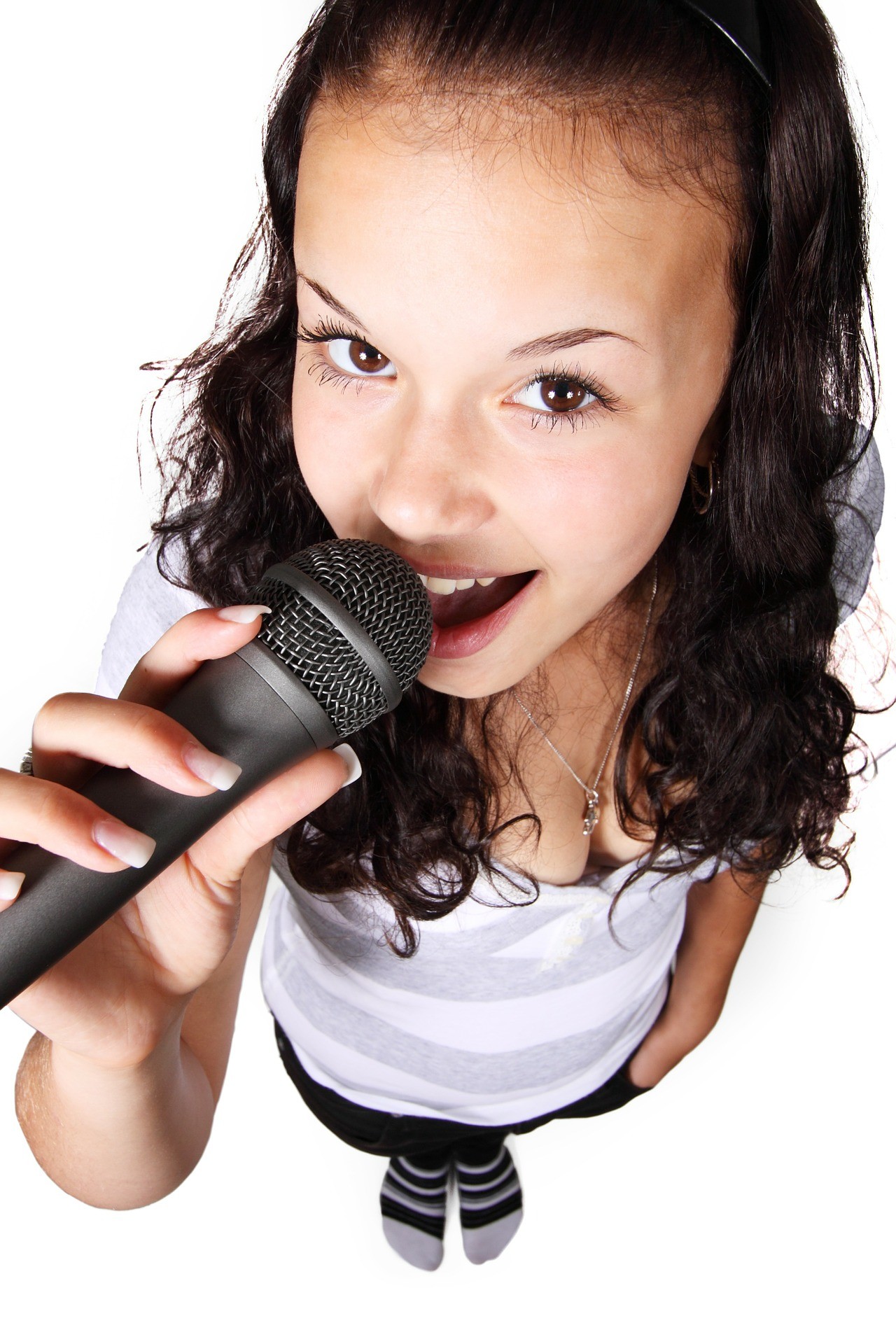 Photograph of a girl singing a song
